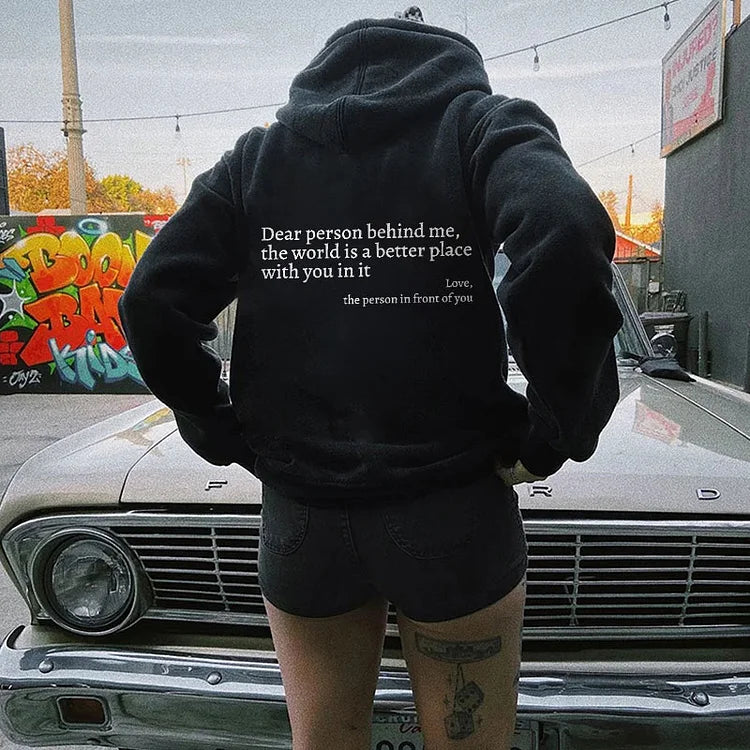 Joy unisex hoodie with an inspiring quote printed on the back.