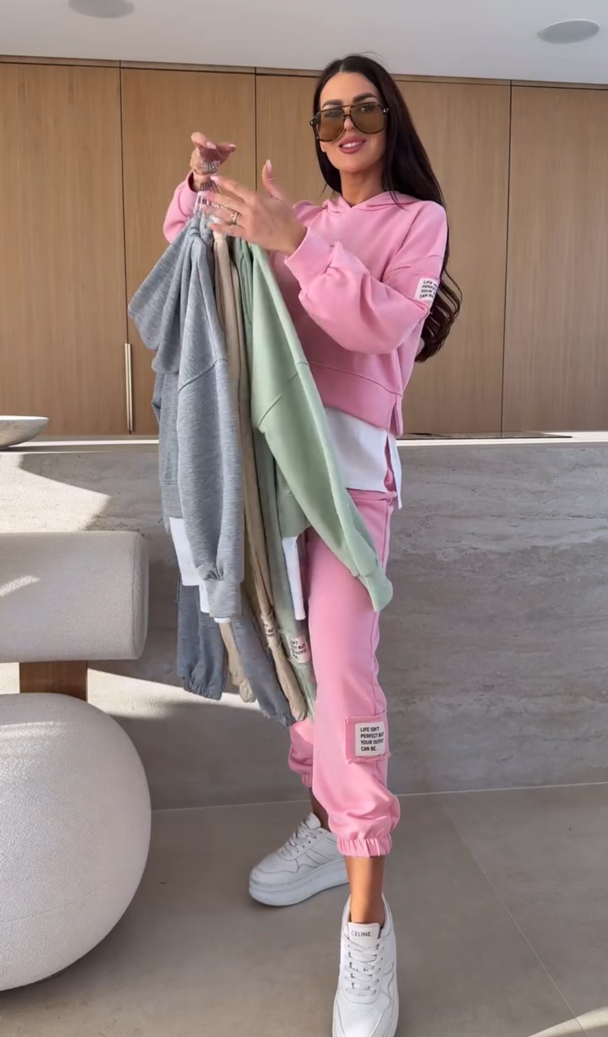 Tessa women's two-piece set with a hooded sweatshirt and matching jogger pants in a soft, elegant fabric.