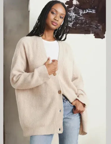 Evelyn women’s knit vest with soft collar and relaxed silhouette, elegant winter layering piece