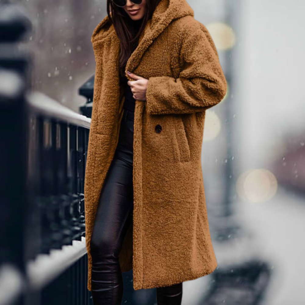 Fiorella women’s long polar style coat with tailored silhouette and flowing design for winter elegance