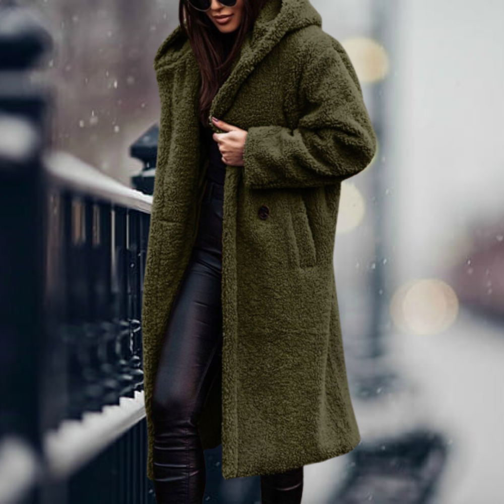 Fiorella women’s long polar style coat with tailored silhouette and flowing design for winter elegance