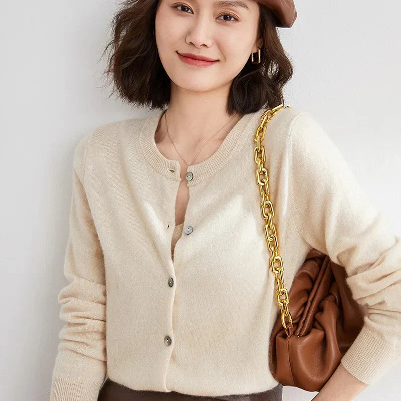 Isla women’s buttoned sweater with round neckline and delicate buttons, soft knit fabric, versatile style