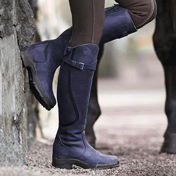 Talia high boots for women with a timeless feminine style and a structured, chunky sole.