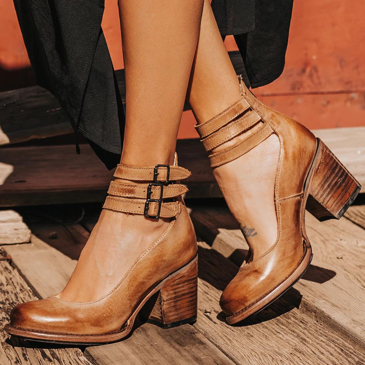 Amara women's elegant heels with a triple strap design and a sleek, modern silhouette.