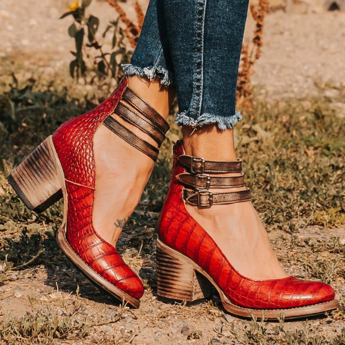 Amara women's elegant heels with a triple strap design and a sleek, modern silhouette.