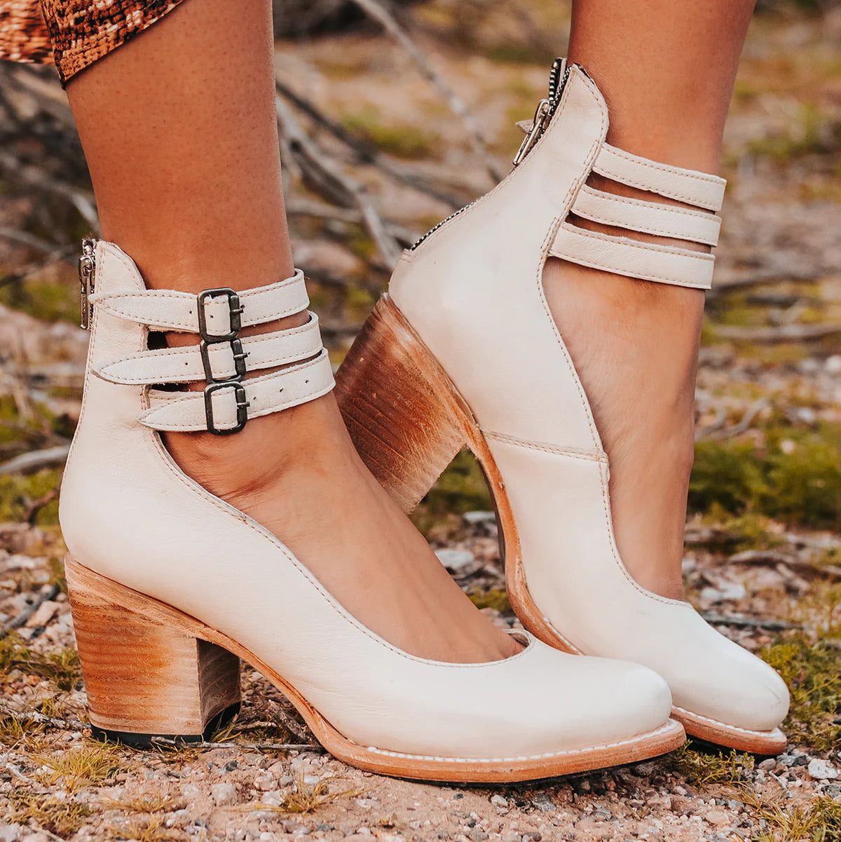 Amara women's elegant heels with a triple strap design and a sleek, modern silhouette.