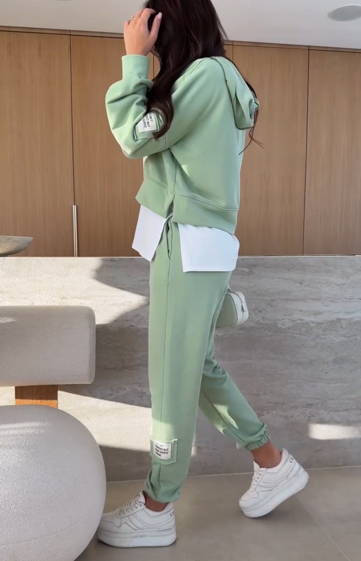 Tessa women's two-piece set with a hooded sweatshirt and matching jogger pants in a soft, elegant fabric.