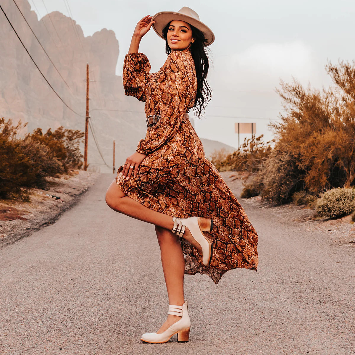 Amara women's elegant heels with a triple strap design and a sleek, modern silhouette.