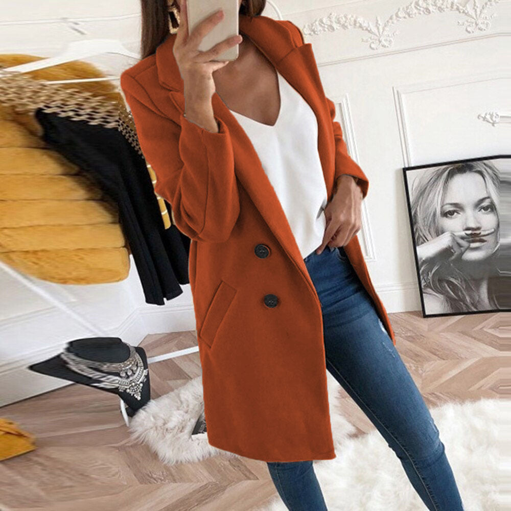 Victoria elegant long winter coat for women with a structured silhouette and clean lines.