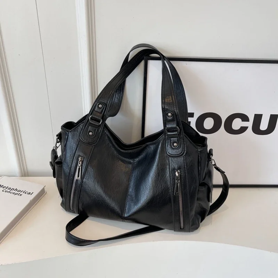 Lyra women’s practical synthetic leather shoulder bag with adjustable strap