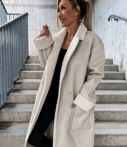 Yvette women's long coat with a structured design, modern look, and a refined cut.