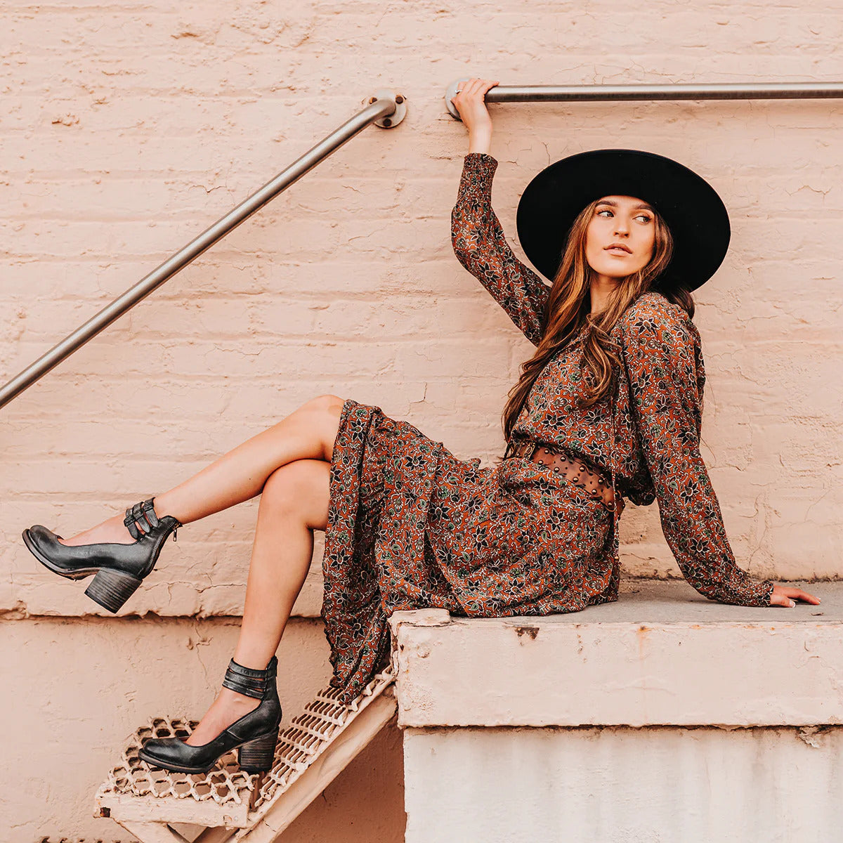 Amara women's elegant heels with a triple strap design and a sleek, modern silhouette.