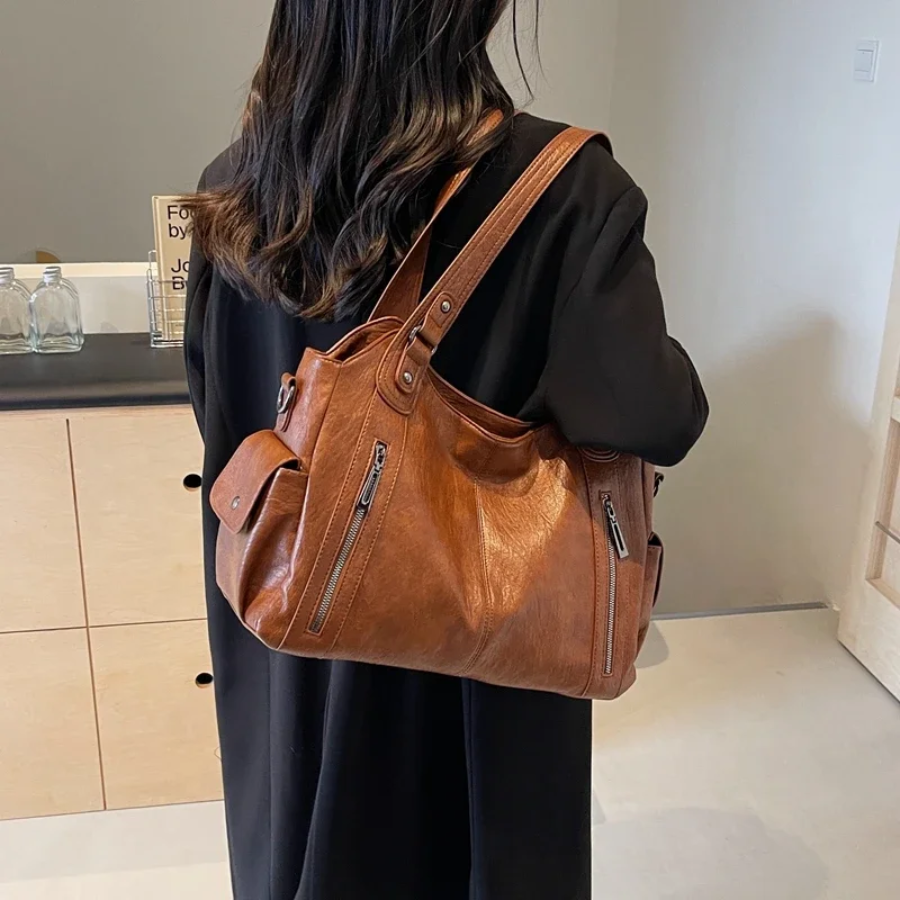 Lyra women’s practical synthetic leather shoulder bag with adjustable strap