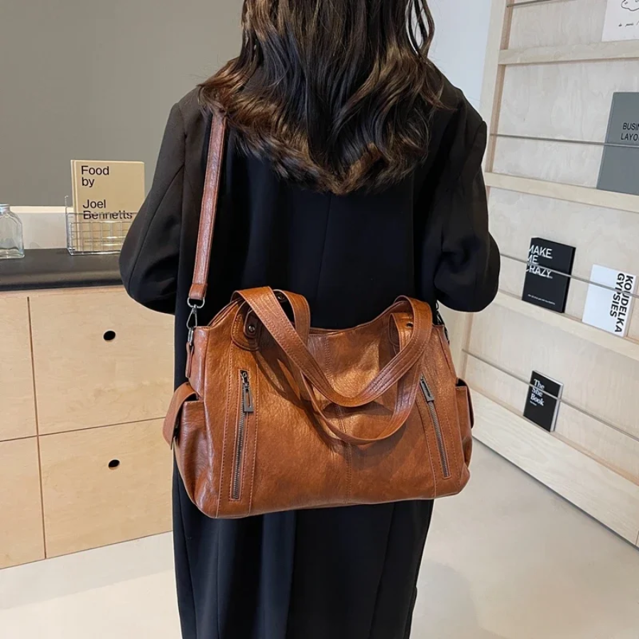 Lyra women’s practical synthetic leather shoulder bag with adjustable strap