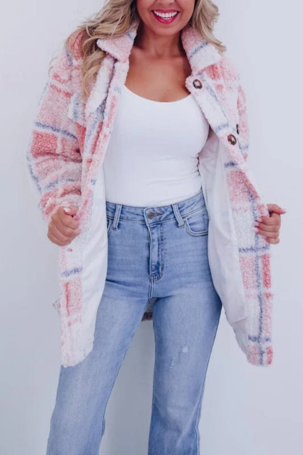 Iris warm checkered jacket with a classic pattern and button closure.