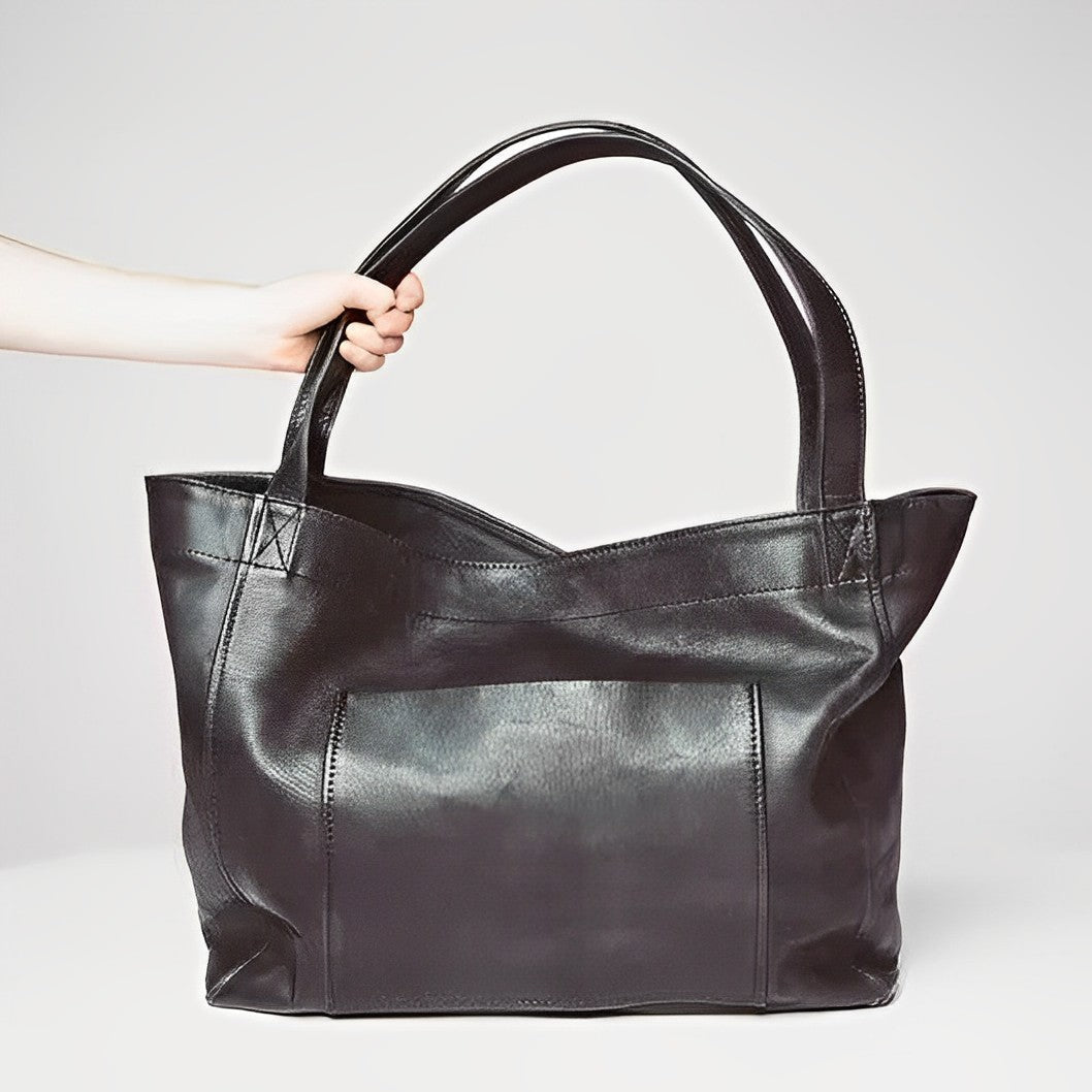 Sora classic vintage leather bag with a structured shape and a rich, soft texture.