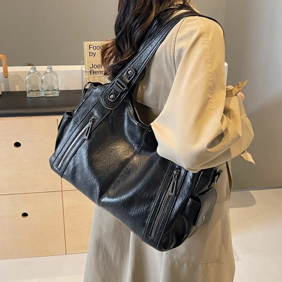Lyra women’s practical synthetic leather shoulder bag with adjustable strap