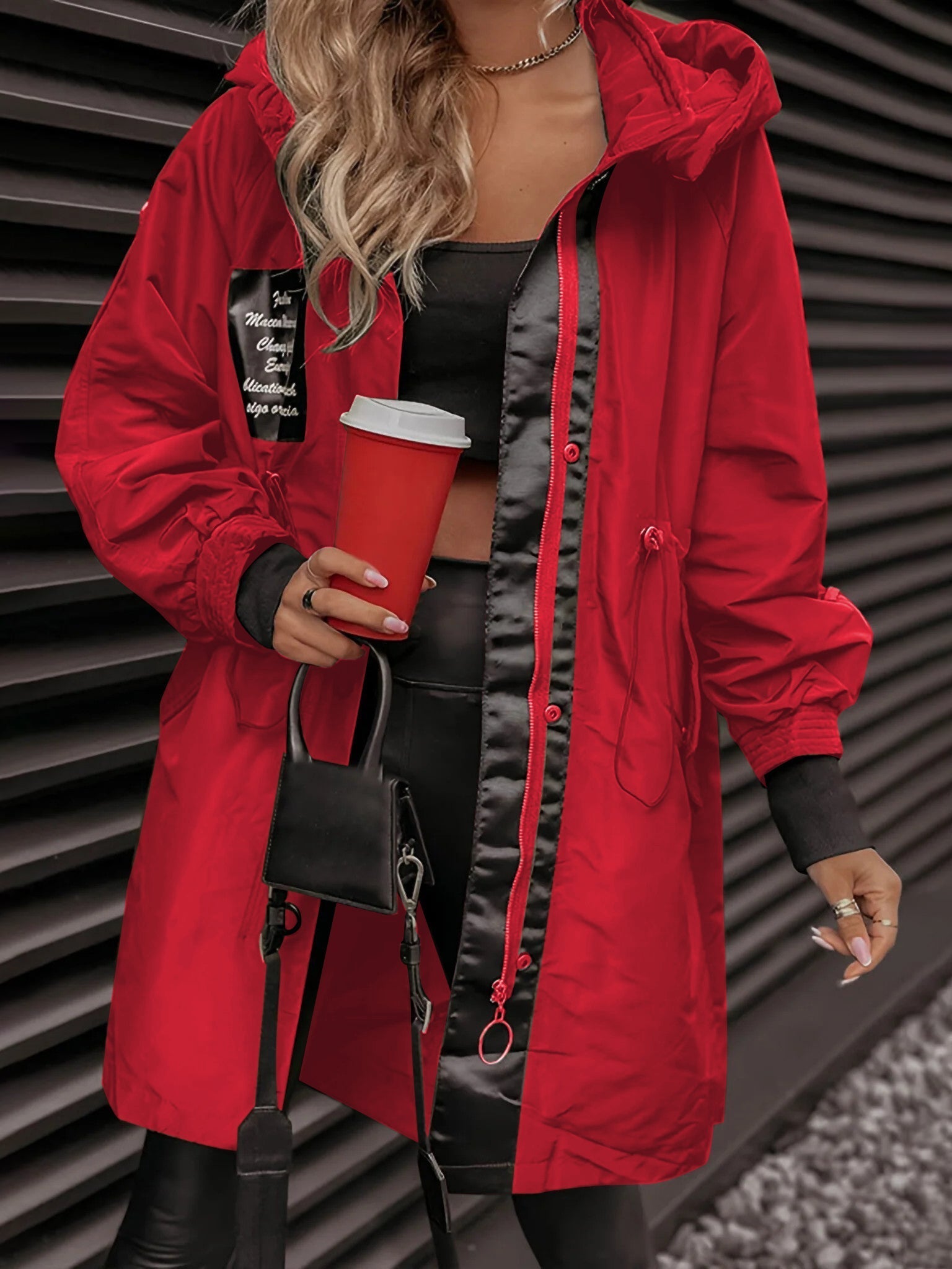 Naomi long sleeve hooded jacket for women, featuring a front zipper and an adjustable hood for warmth and style.