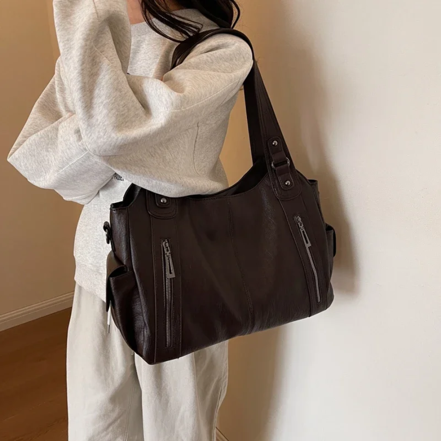 Lyra women’s practical synthetic leather shoulder bag with adjustable strap