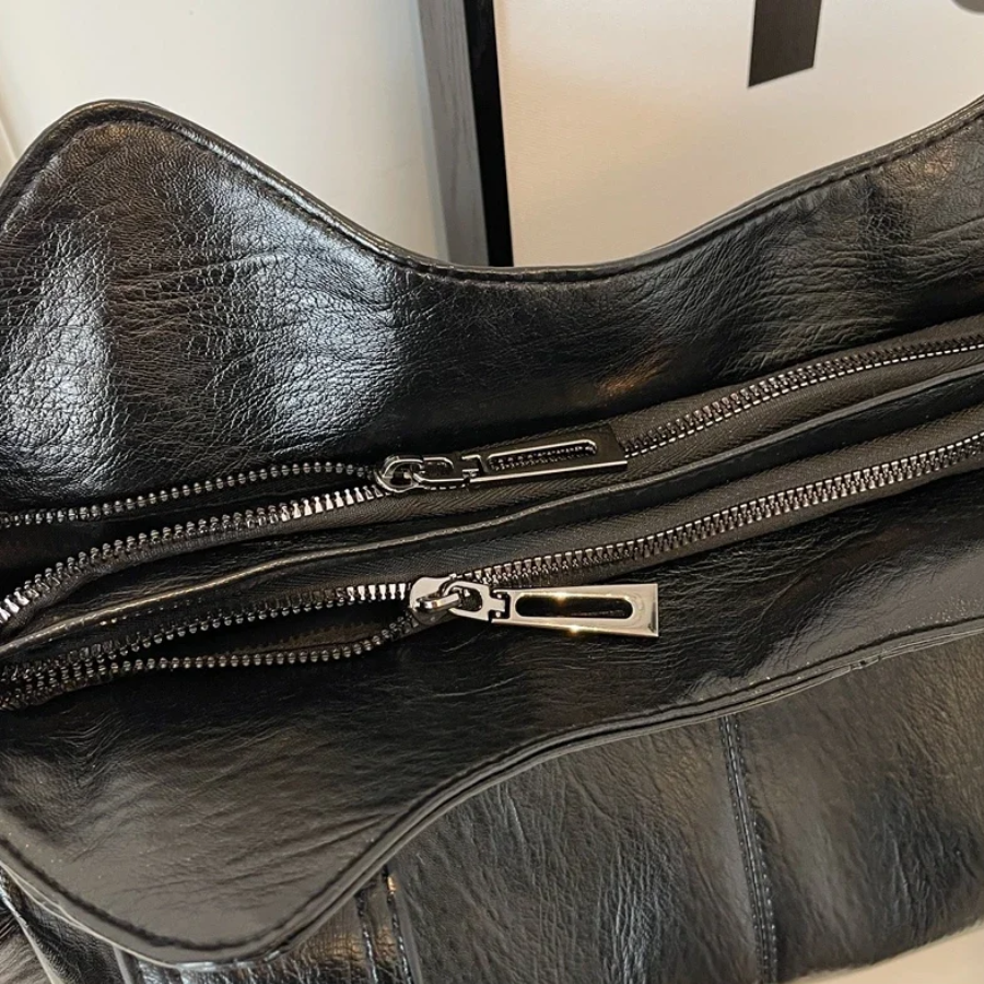 Lyra women’s practical synthetic leather shoulder bag with adjustable strap
