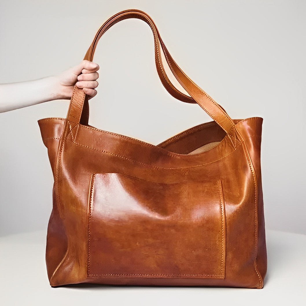 Sora classic vintage leather bag with a structured shape and a rich, soft texture.
