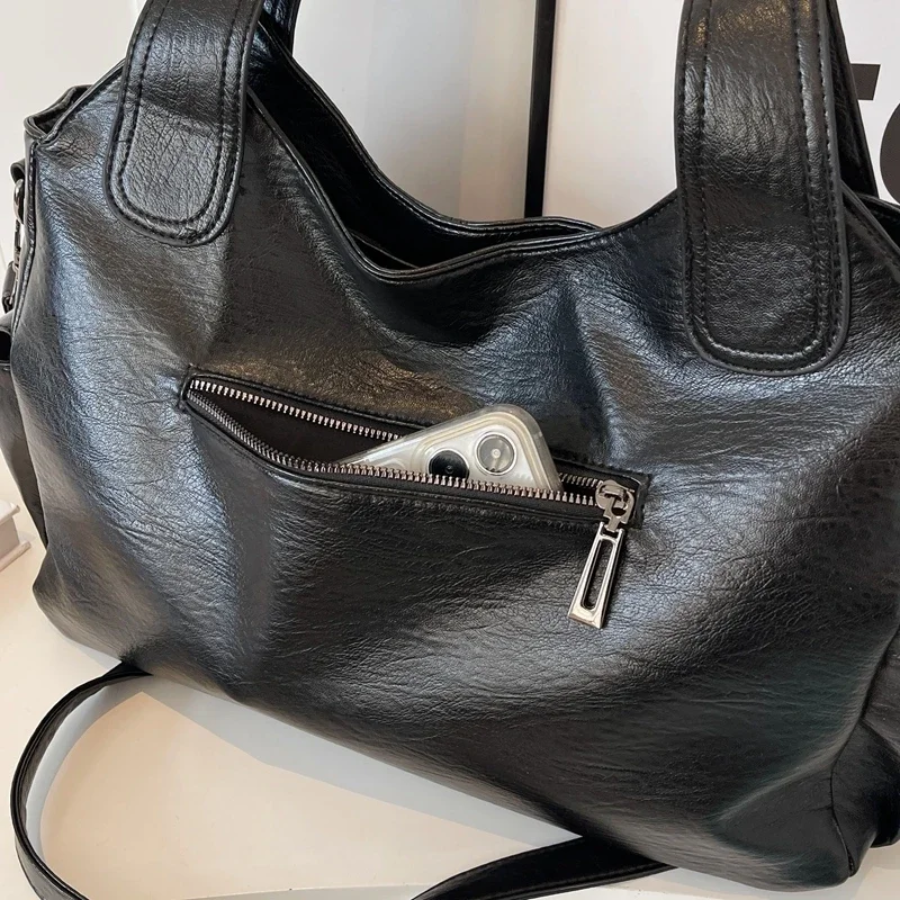 Lyra women’s practical synthetic leather shoulder bag with adjustable strap