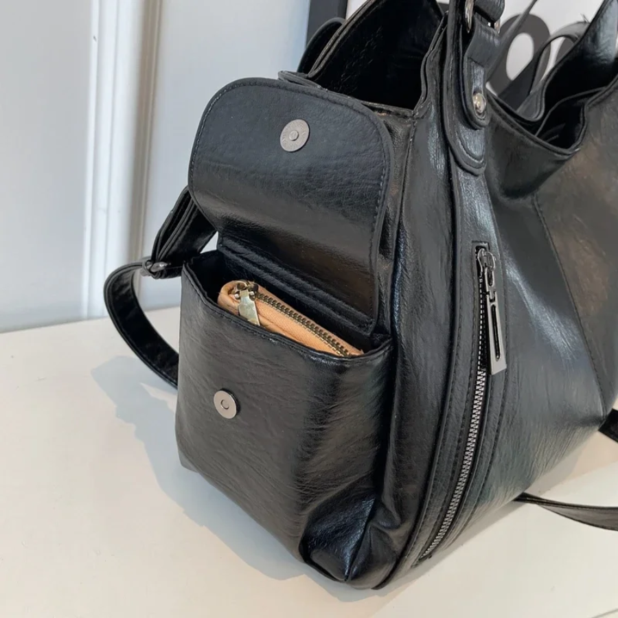 Lyra women’s practical synthetic leather shoulder bag with adjustable strap