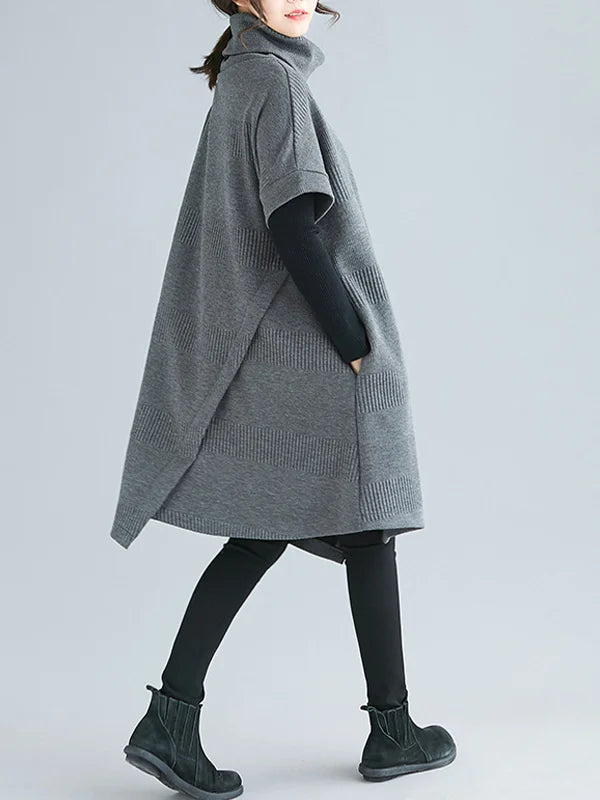 Sloane fluid women's dress with an asymmetrical high collar and a modern, relaxed fit.