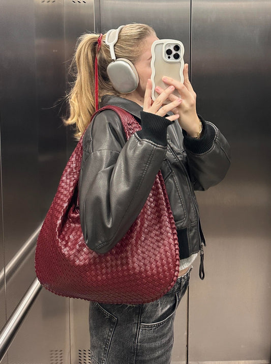 Women’s structured handbag with elegant design and spacious interior