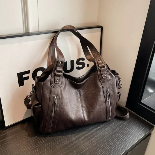 Lyra women’s practical synthetic leather shoulder bag with adjustable strap