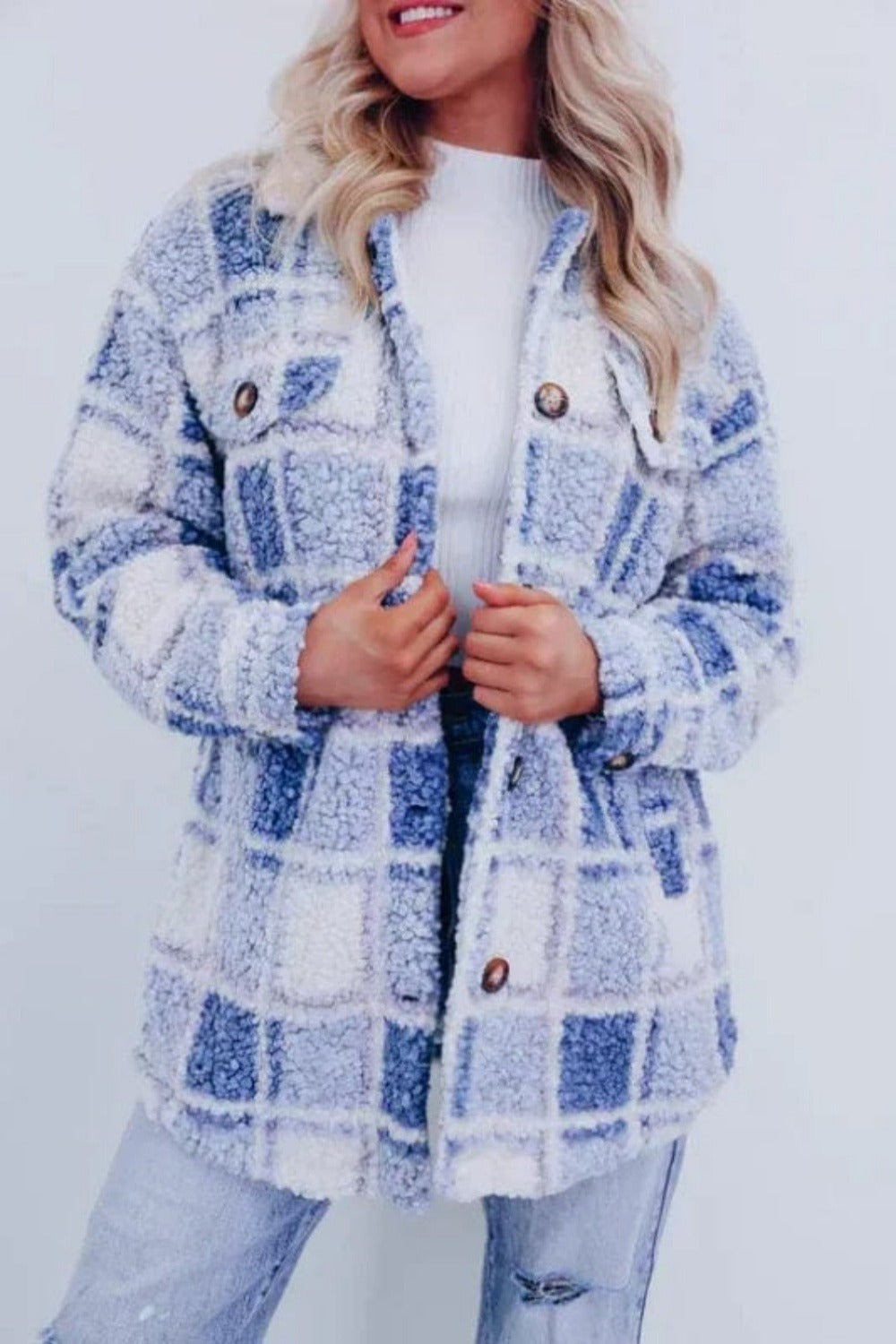 Iris warm checkered jacket with a classic pattern and button closure.