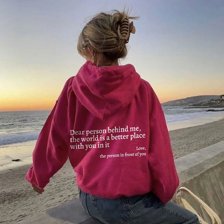 Joy unisex hoodie with an inspiring quote printed on the back.