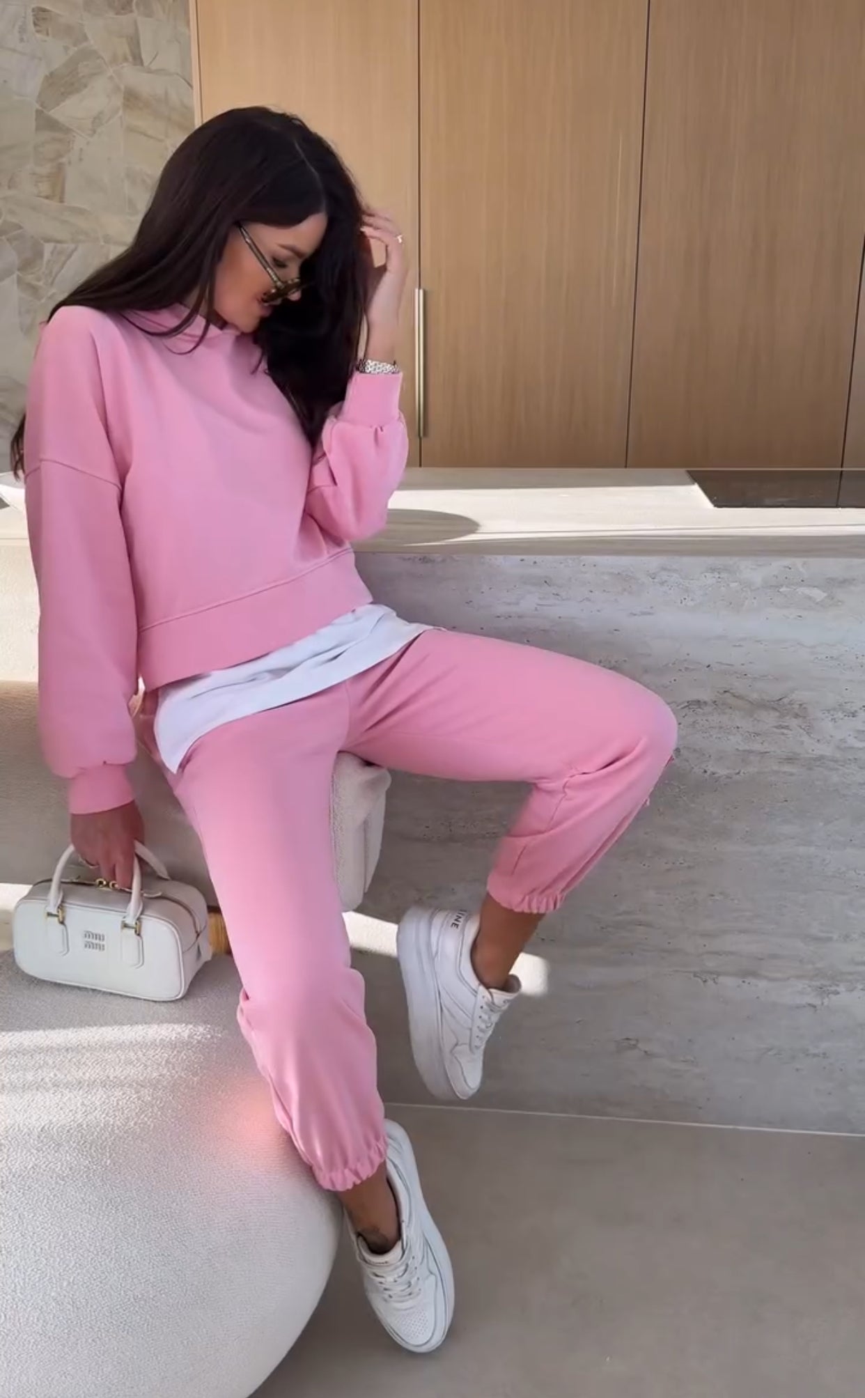 Tessa women's two-piece set with a hooded sweatshirt and matching jogger pants in a soft, elegant fabric.
