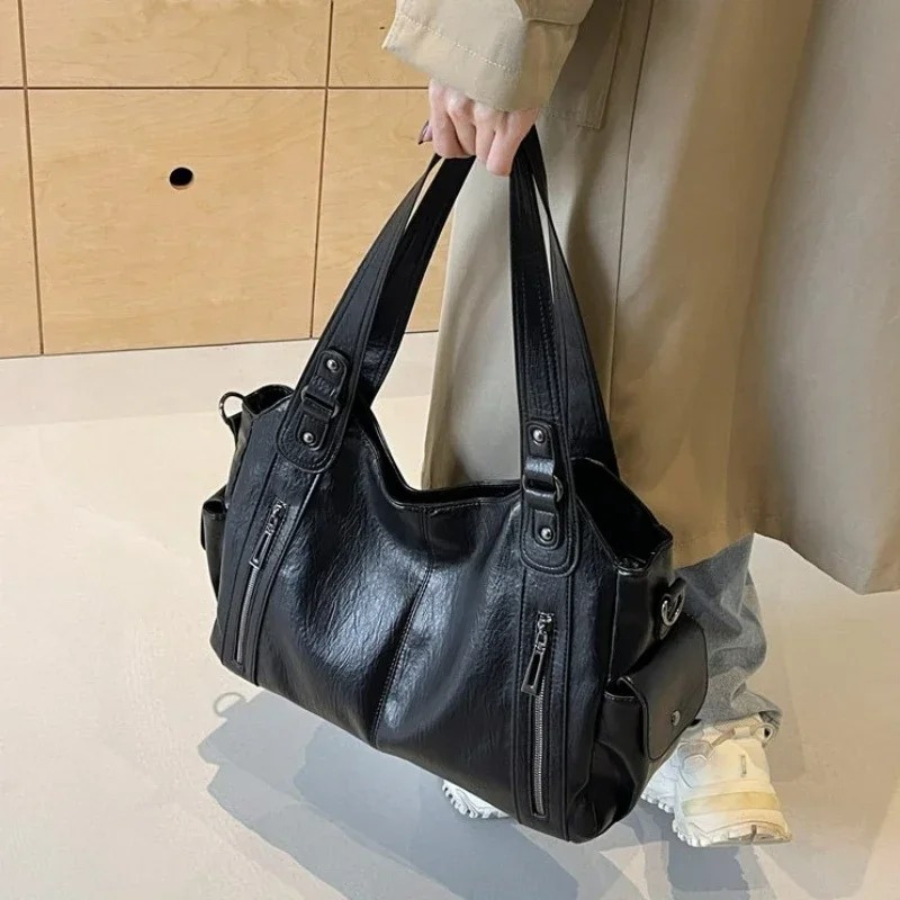 Lyra women’s practical synthetic leather shoulder bag with adjustable strap