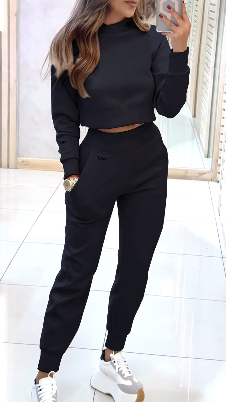 Women’s knit two-piece set with high-neck sweater and trousers