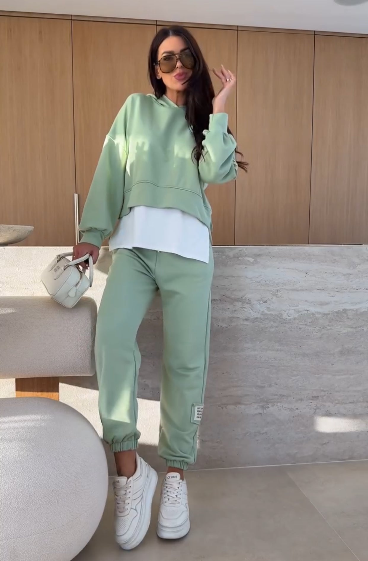 Tessa women's two-piece set with a hooded sweatshirt and matching jogger pants in a soft, elegant fabric.