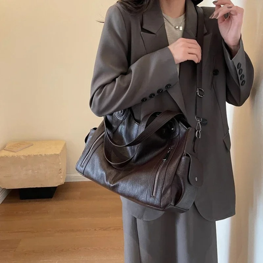 Lyra women’s practical synthetic leather shoulder bag with adjustable strap
