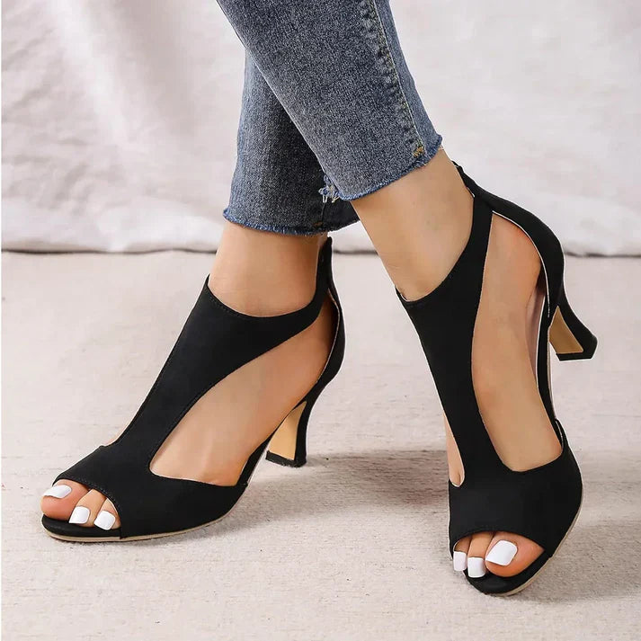 Brynn elegant heeled shoes for women with an open-toe design and a leather-look finish.
