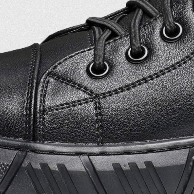 Cyrus men's faux leather boots with a streamlined shape and a sturdy sole for good support.