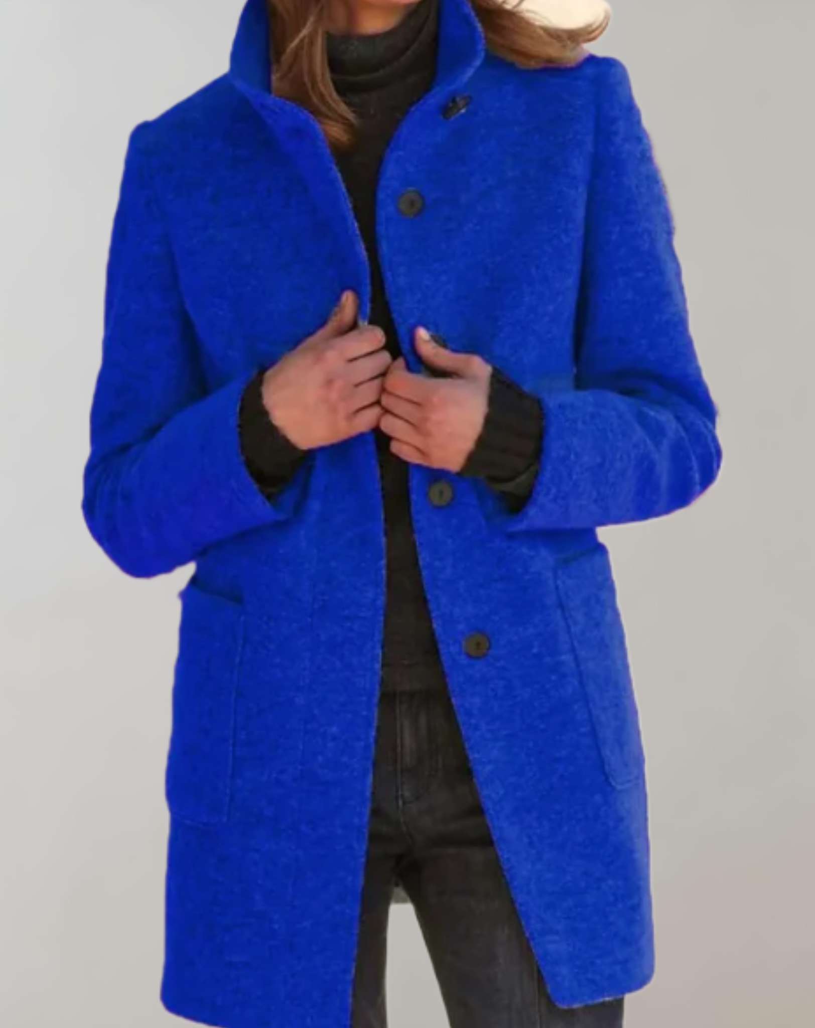 Eleanor women's midi length wool coat with a high collar and fluid silhouette.