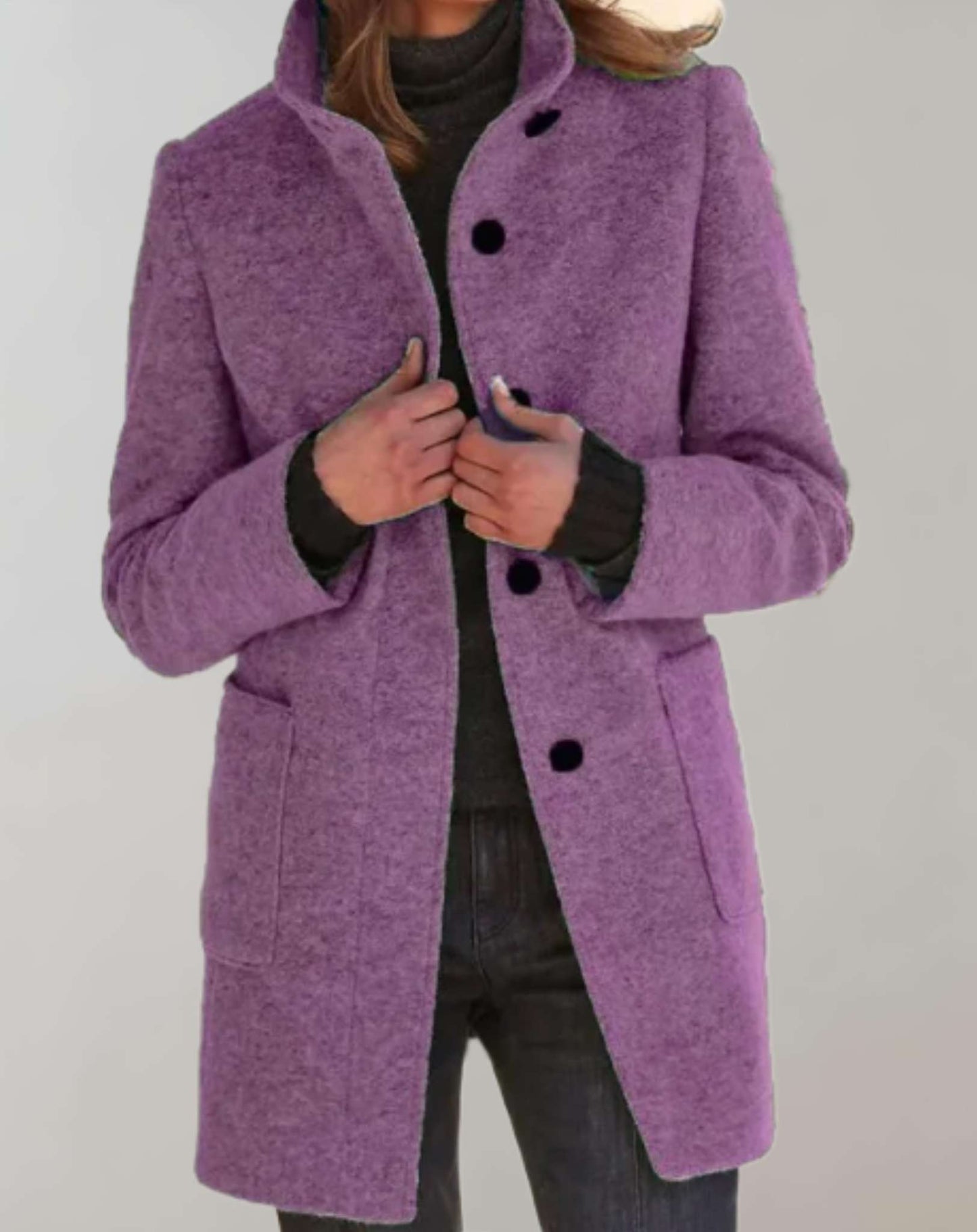 Eleanor women's midi length wool coat with a high collar and fluid silhouette.
