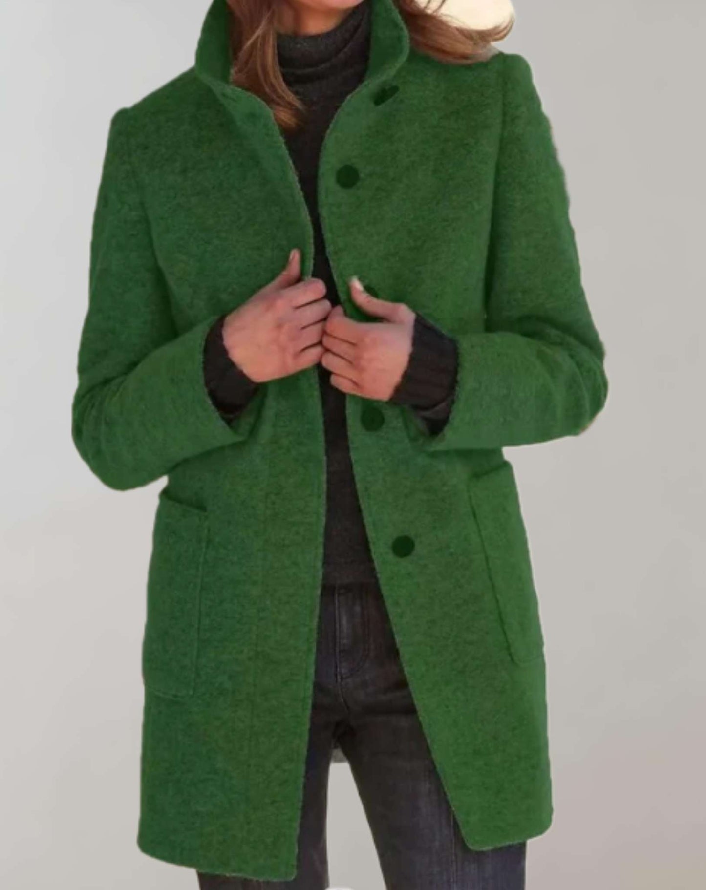 Eleanor women's midi length wool coat with a high collar and fluid silhouette.