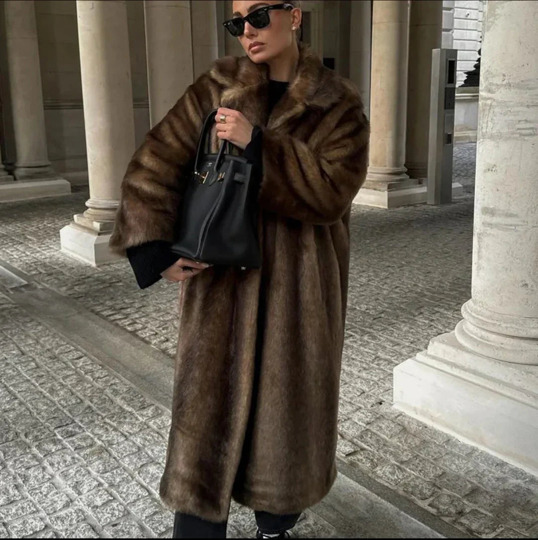 Skylar elegant faux fur coat for women with a fluid, enveloping design and luxurious texture.