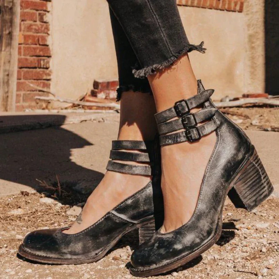 Amara women's elegant heels with a triple strap design and a sleek, modern silhouette.