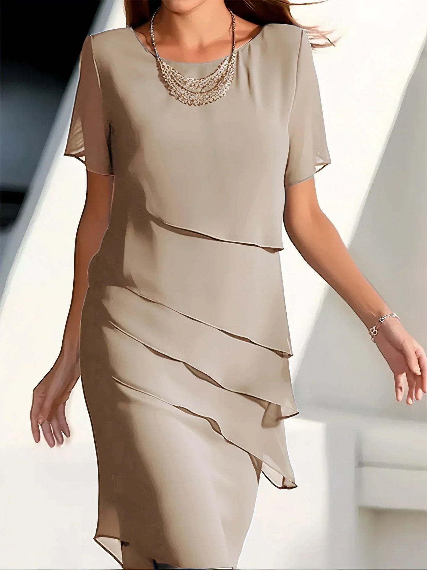 Elara women’s cocktail dress with layered diagonal ruffles and knee-length silhouette