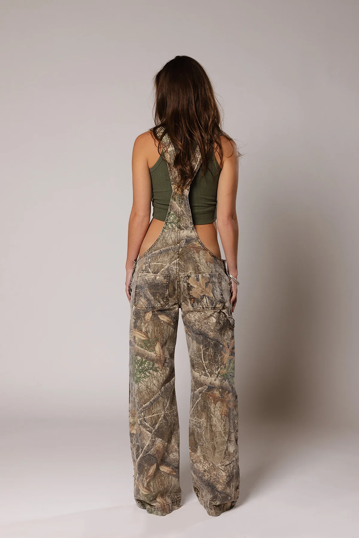 Marisol women’s denim jumpsuit with deep V-neck and tailored fit, bold and contemporary style