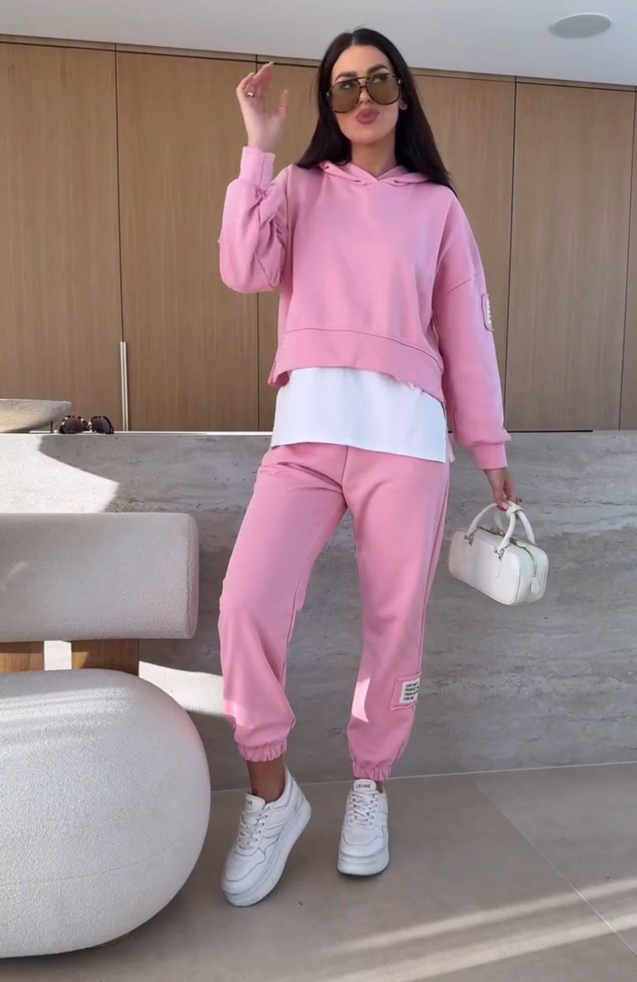 Tessa women's two-piece set with a hooded sweatshirt and matching jogger pants in a soft, elegant fabric.
