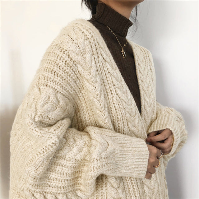 Women’s long knit cardigan with open front and side pockets