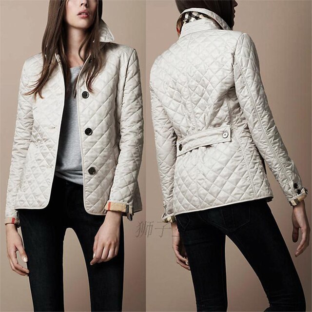 Elara women’s winter jacket with high collar and diamond pattern, tailored fit for winter style