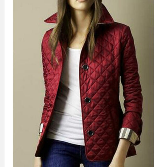 Elara women’s winter jacket with high collar and diamond pattern, tailored fit for winter style